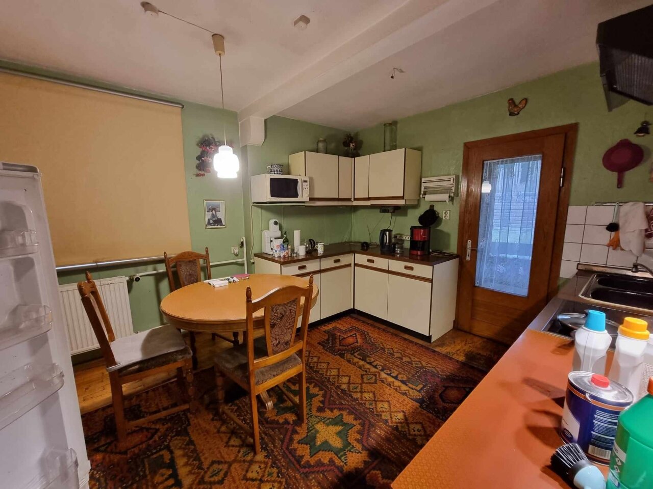 🏠 Platzwunder mit Potenzial – 5-Zimmer‑Reihenendhaus in idyllischem Winzgrundstück