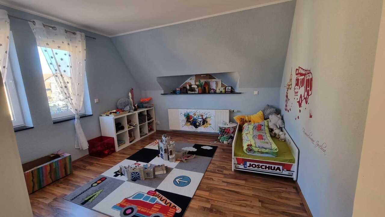 Kinderzimmer im Dachgeschoss Kinderzimmer im Dachgeschoss