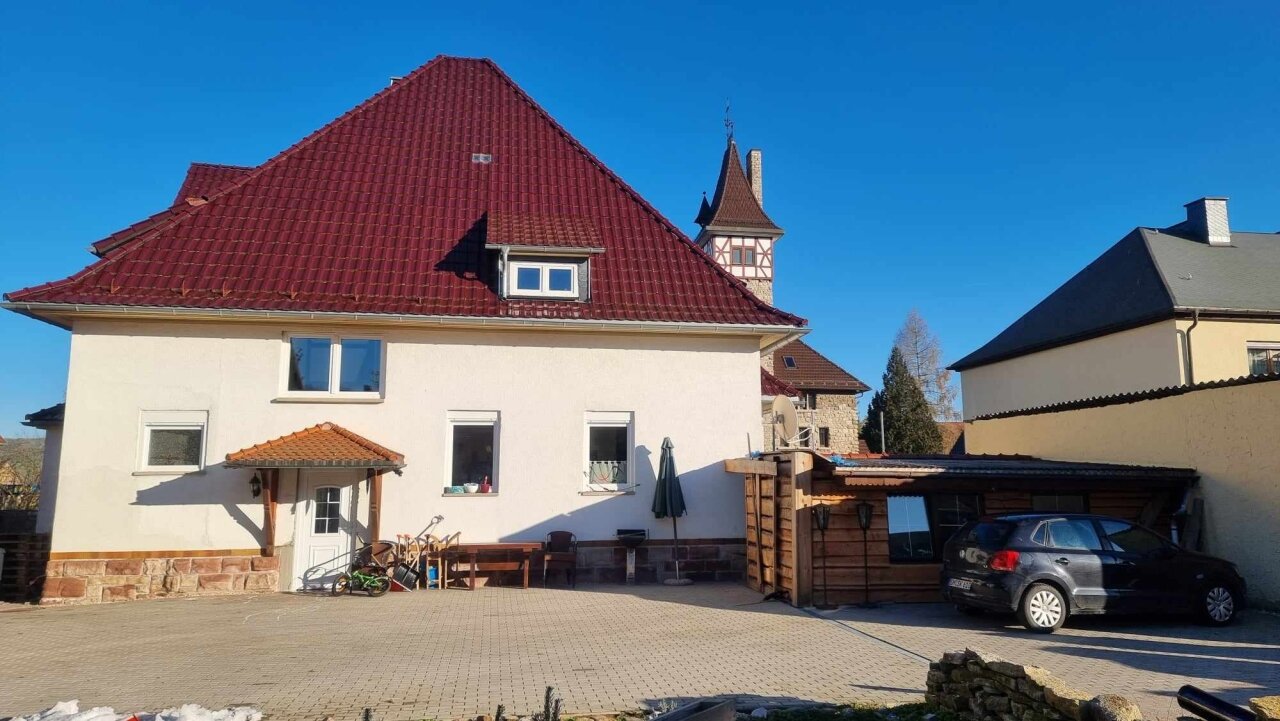Haus Gartenseite mit Stellplätzen Haus Gartenseite mit Stellplätzen
