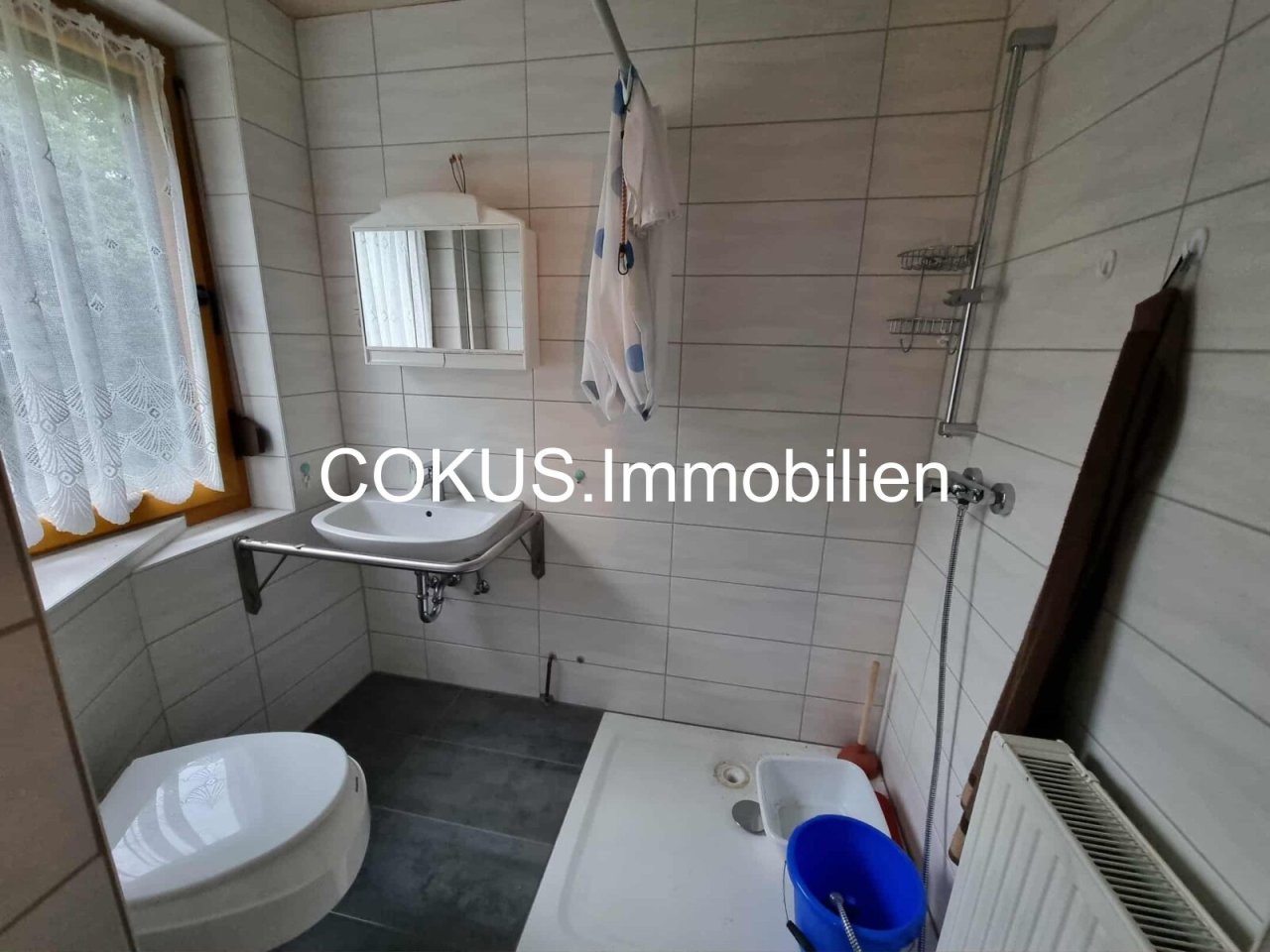 Bad mit WC WT + Dusche im EG