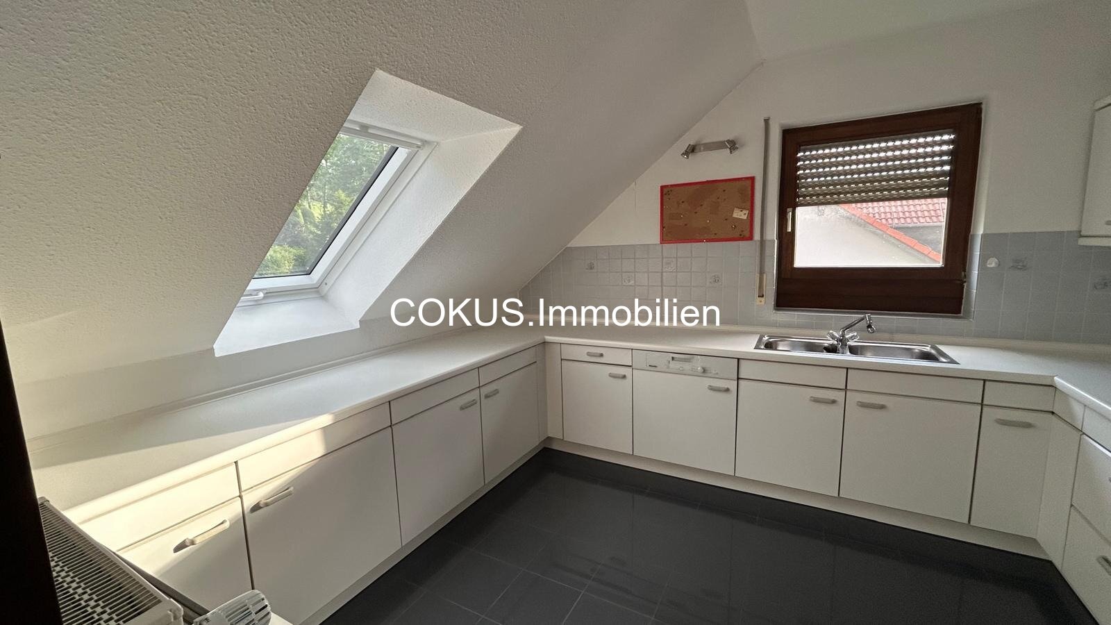 11 - Kueche mit Dachfenster ueber der Arbeitsflaeche 11 - Kueche mit Dachfenster ueber der Arbeitsflaeche