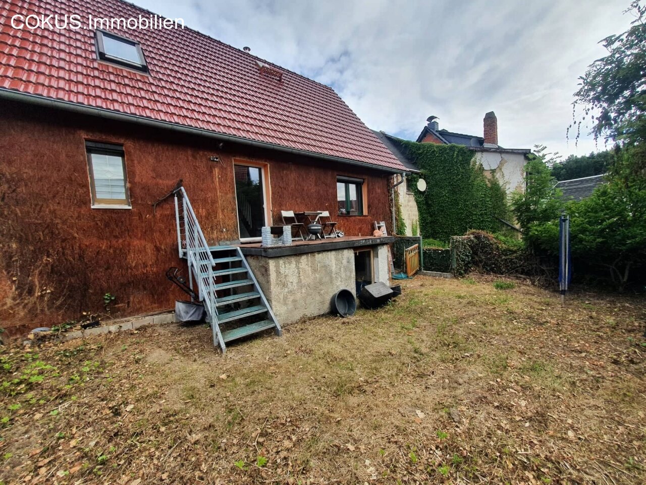 Rückansicht mit Terrasse